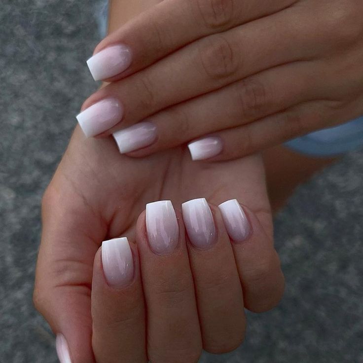 Chic Ombre Nails: White to Delicate Pink Gradient with Modern Square Tips.