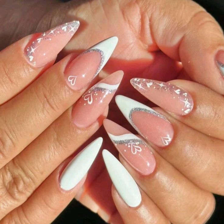 Romantic Elegant Almond-Shaped Nail Design with Soft Pink, White, Heart Shapes, and Glitter Accents.