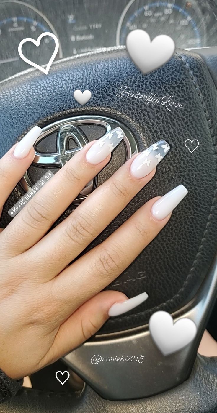 Sophisticated Ombre Nail Design Blending Nude and White with Elegant Grey Accents.