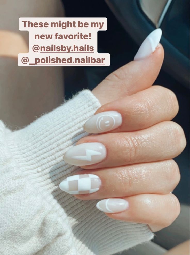 Contemporary Nail Design: White Base with Unique Graphic Patterns and Clean Lines.