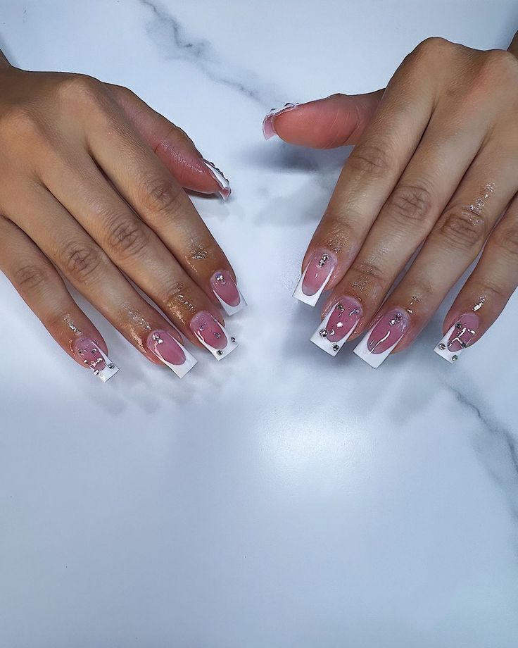 Elegant Pink and White French Tip Nail Design with Glamorous Rhinestone Accents