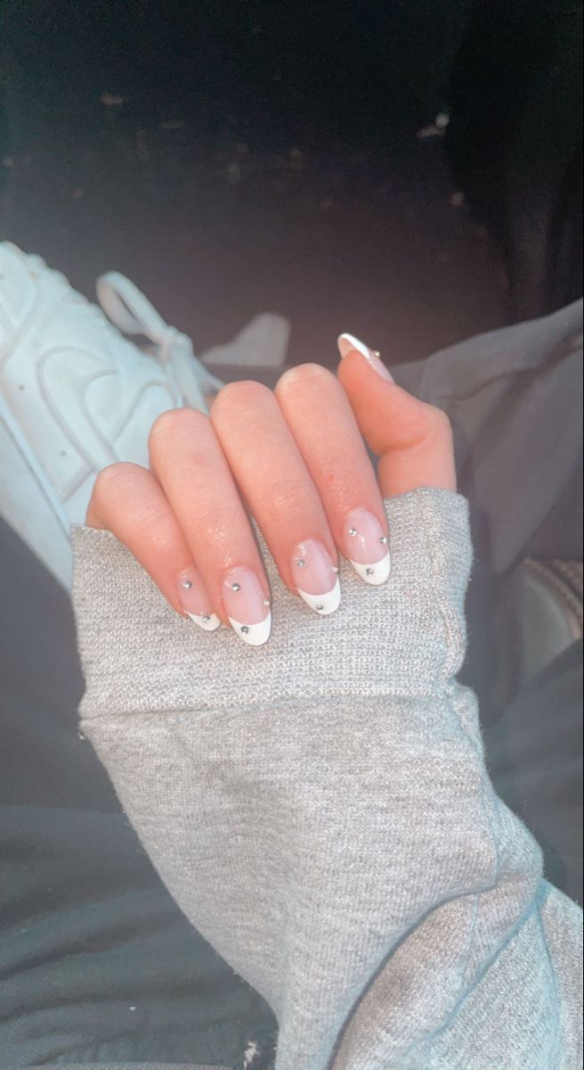 Chic French Manicure with Subtle Rhinestone Embellishments