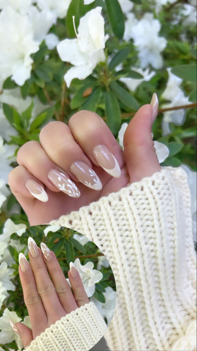 Modern French Manicure with Floral Accents for a Spring-Inspired Look