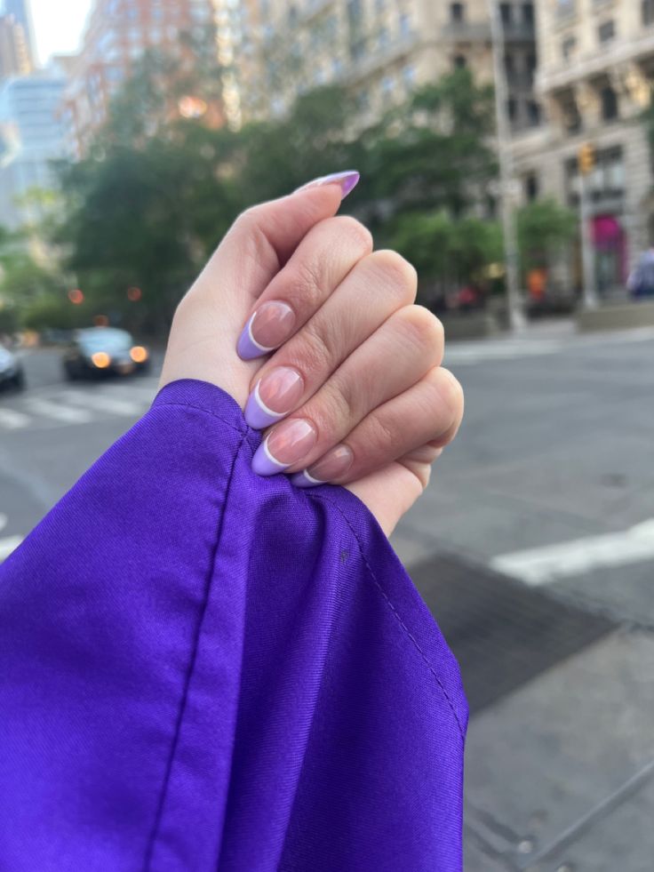 Chic Ombre Nail Design with Light Purple Tips Elevates Urban Elegance.