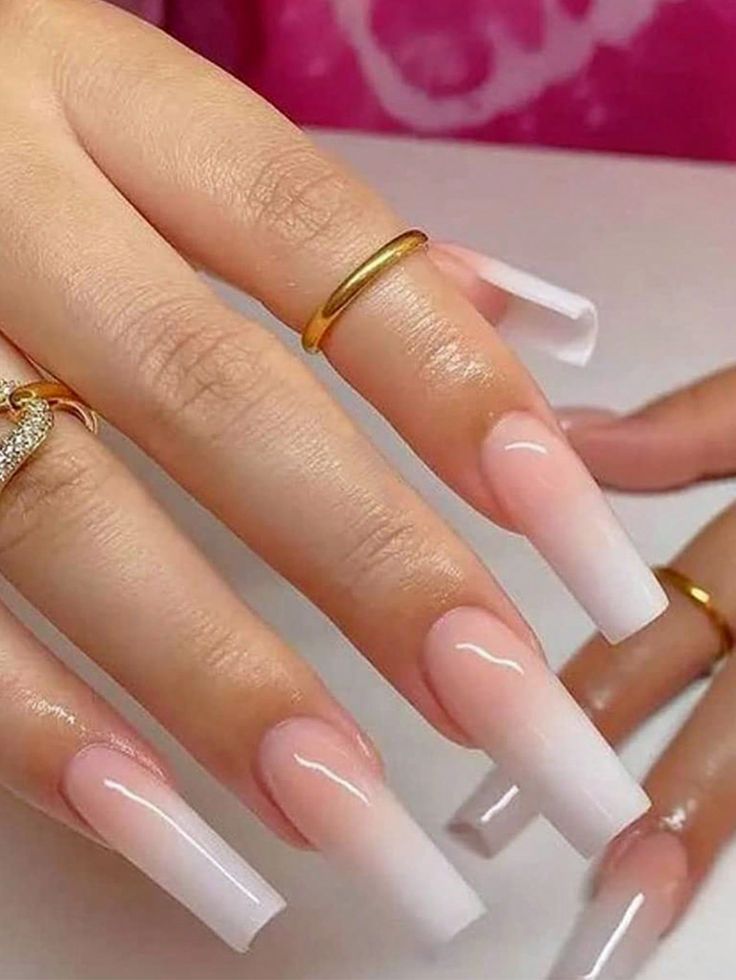 Sophisticated Ombre Nails: A Stunning Pink-to-White Transition Accented with Delicate Rings