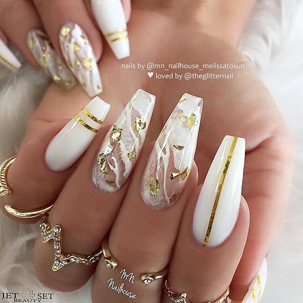 Chic Elegant Nail Design with White, Transparent Bases, and Gold Leaf Accents.