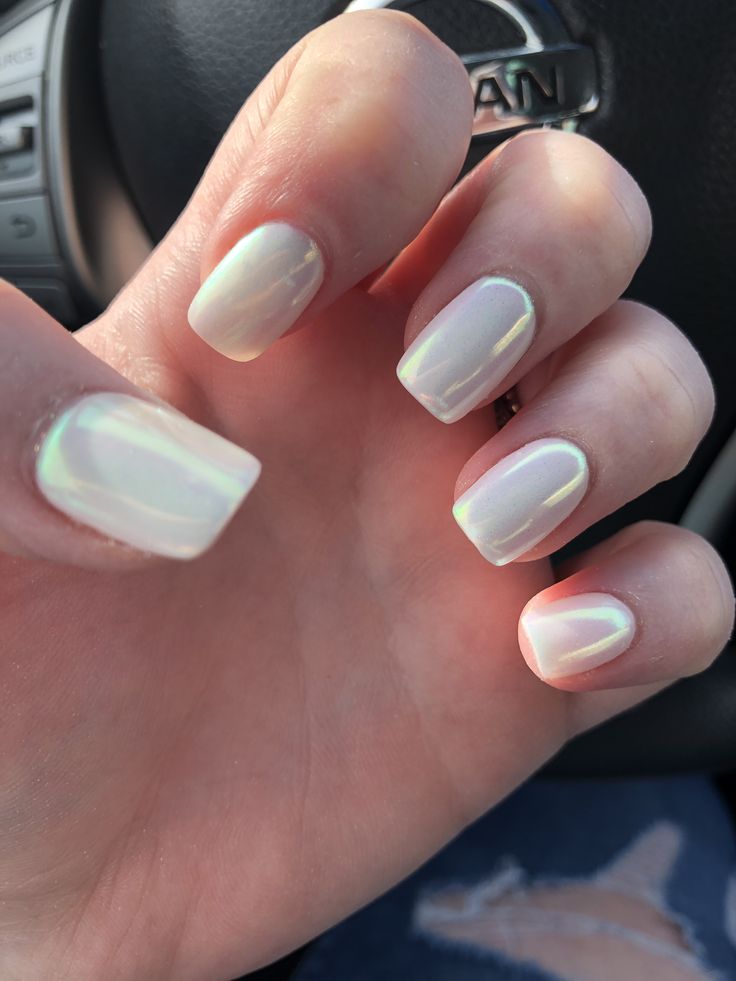 Elegant Iridescent Nail Design with Soft White Base and Subtle Shimmer