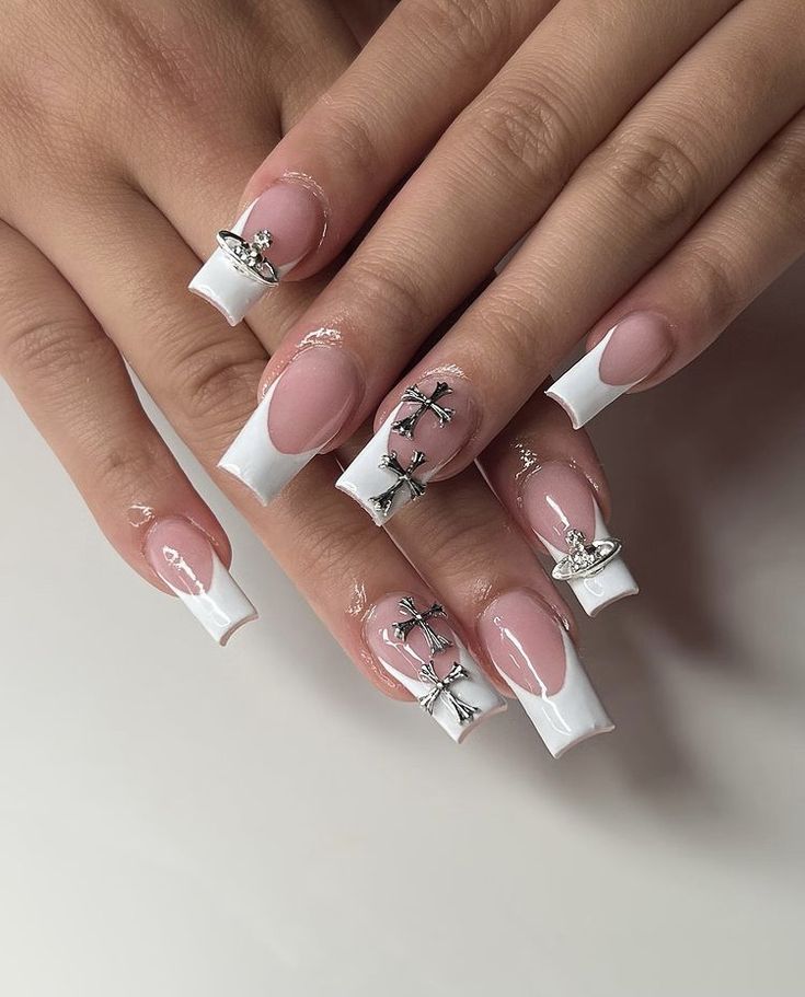 Sophisticated Long Acrylic Nails with Classic French Tips and Intricate Silver Charms