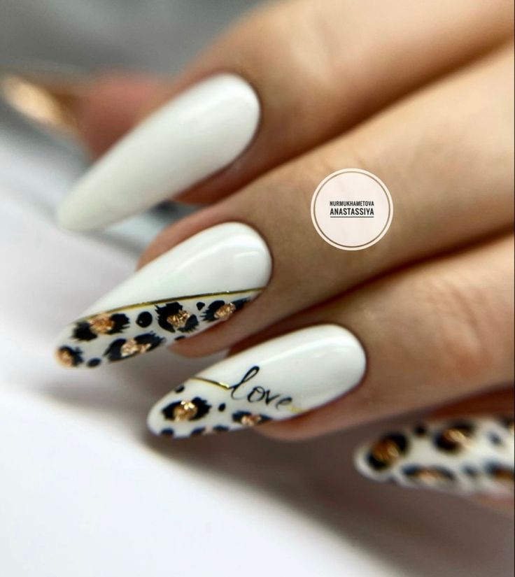 Chic Nail Design: Elegant White and Playful Leopard Print with Gold Accents