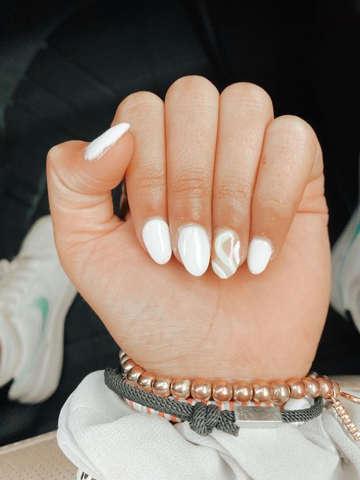 Elegant Almond-Shaped White Nails with Artistic Swirl Accent