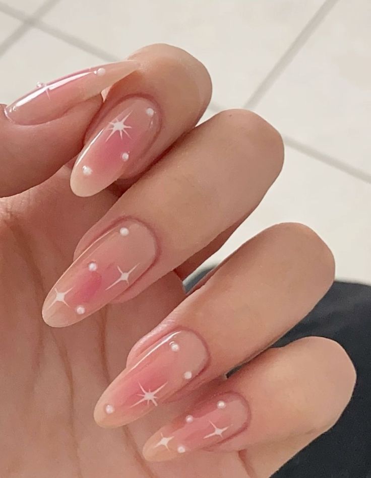 Charming Pink Ombre Nails with Sparkling Accents for Every Occasion