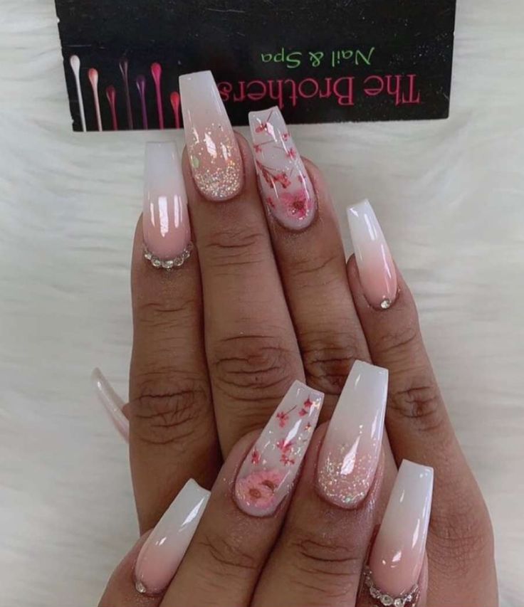 Chic Long Square Tips: Elegant Ombre Nail Design with Glitter and Floral Accents.