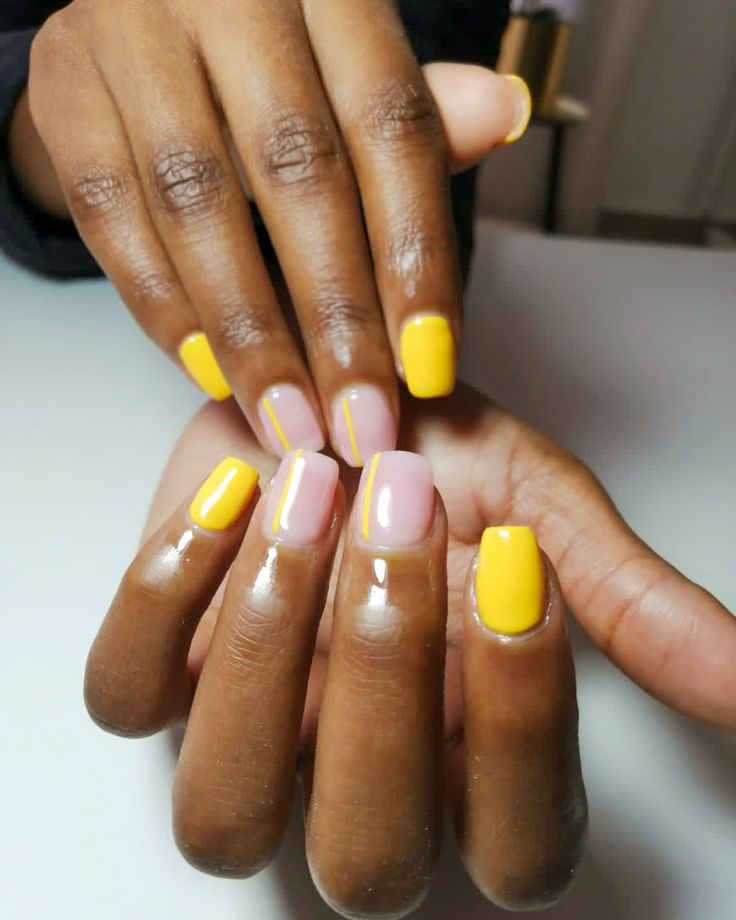 Bold Yellow and Soft Pink Nail Design: A Playful Yet Sophisticated Look.