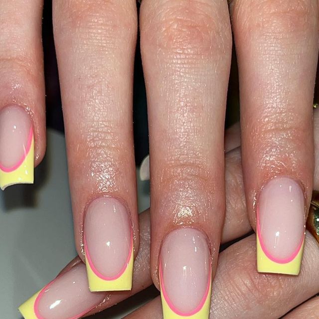 Playful Yet Sophisticated Pastel Nail Design with Yellow French Tips.