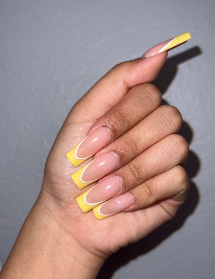 Chic Square Nails with Vibrant Yellow French Tips and Elegant Nude Base.