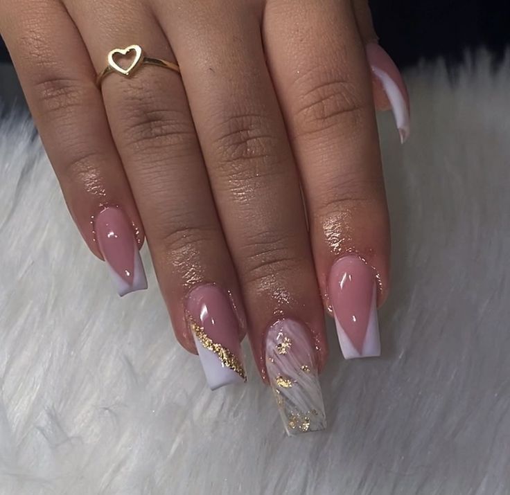 Sophisticated Nail Design: Soft Pink and White with Gold Accents