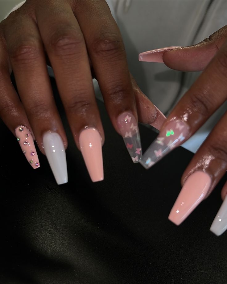 Trendy Pastel Stiletto Nail Design with Butterflies and Rhinestones