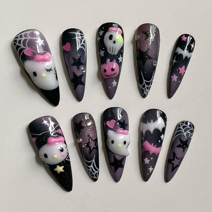 Playful Whimsical Nail Design: A Spooky-Cute Blend of Skulls, Hearts, and Hello Kitty Accents.