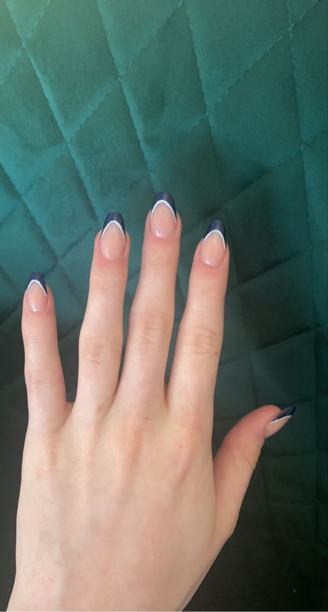 Chic Almond-Shaped Nails with Unique Nude and Navy French Tips