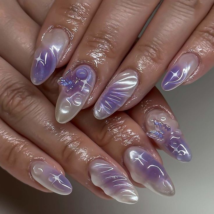 Ethereal Gradient Ombre Nails with Artistic Floral and Abstract Designs in Soft Purple and White.