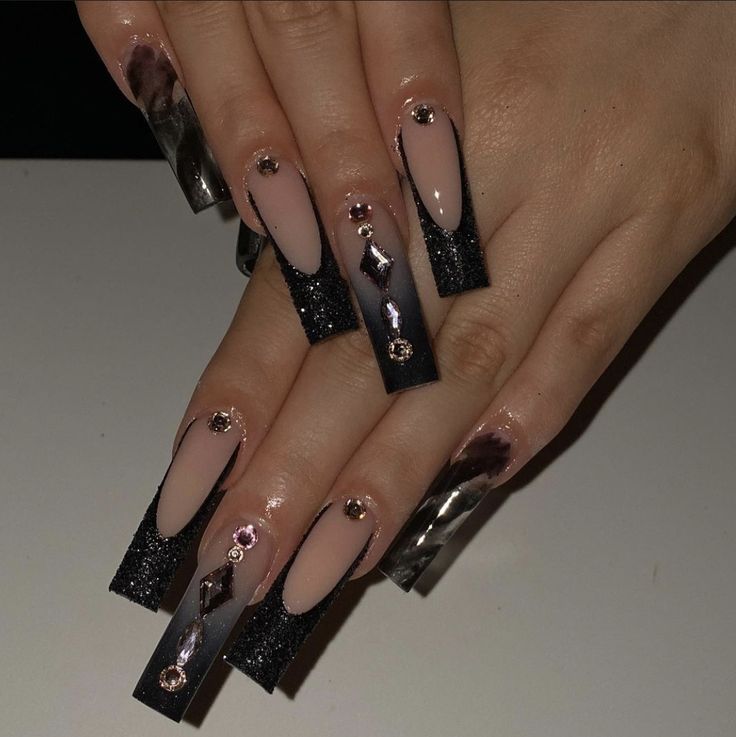 Elegant Two-Tone Long Nails with Rhinestone Embellishments and Geometric Designs