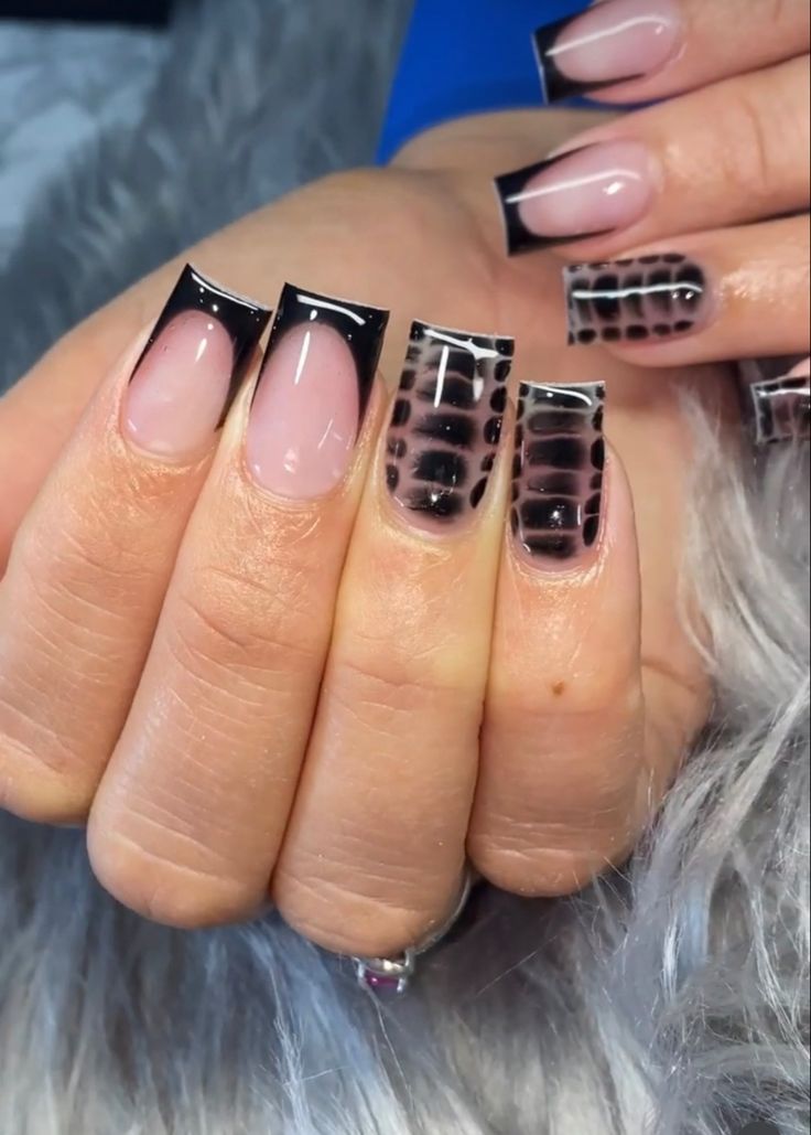 Edgy Nude and Black Animal Print Nail Design for Bold Statements.