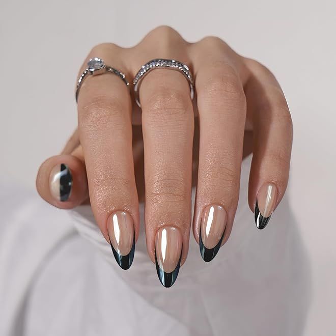 Chic Almond-Shaped Nail Design with Glossy Finish and Striking Black Tips.