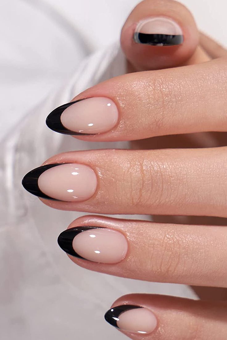 Chic Reimagined French Manicure: Nude Base with Sleek Black Tips