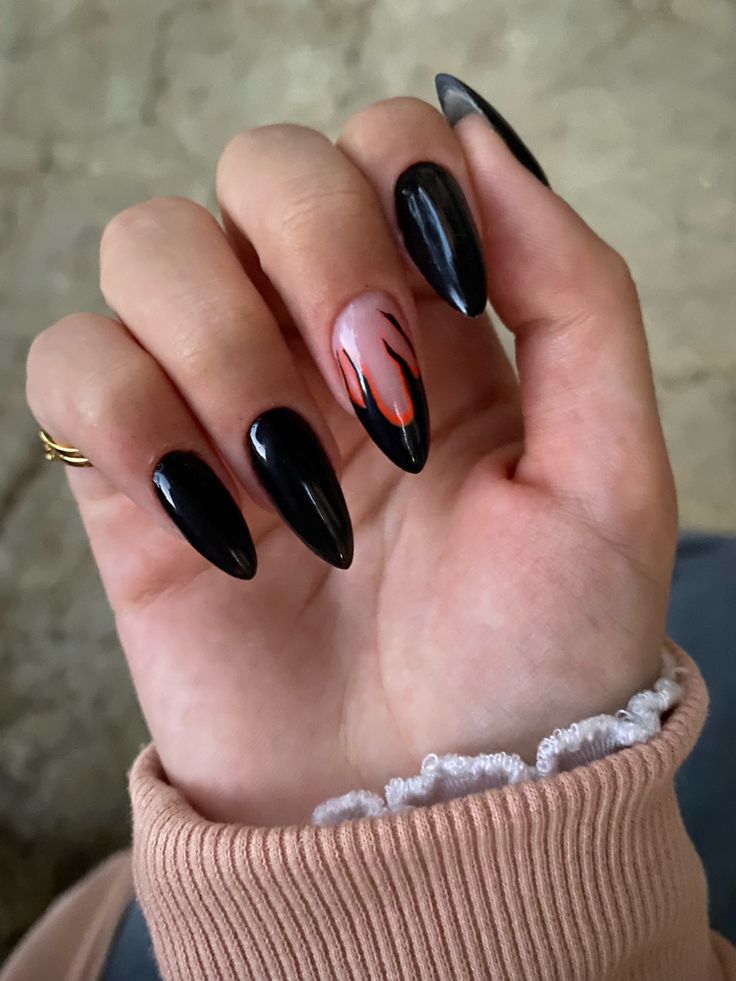 Striking Elegance: Dramatic Flame Design on Black Almond Nails