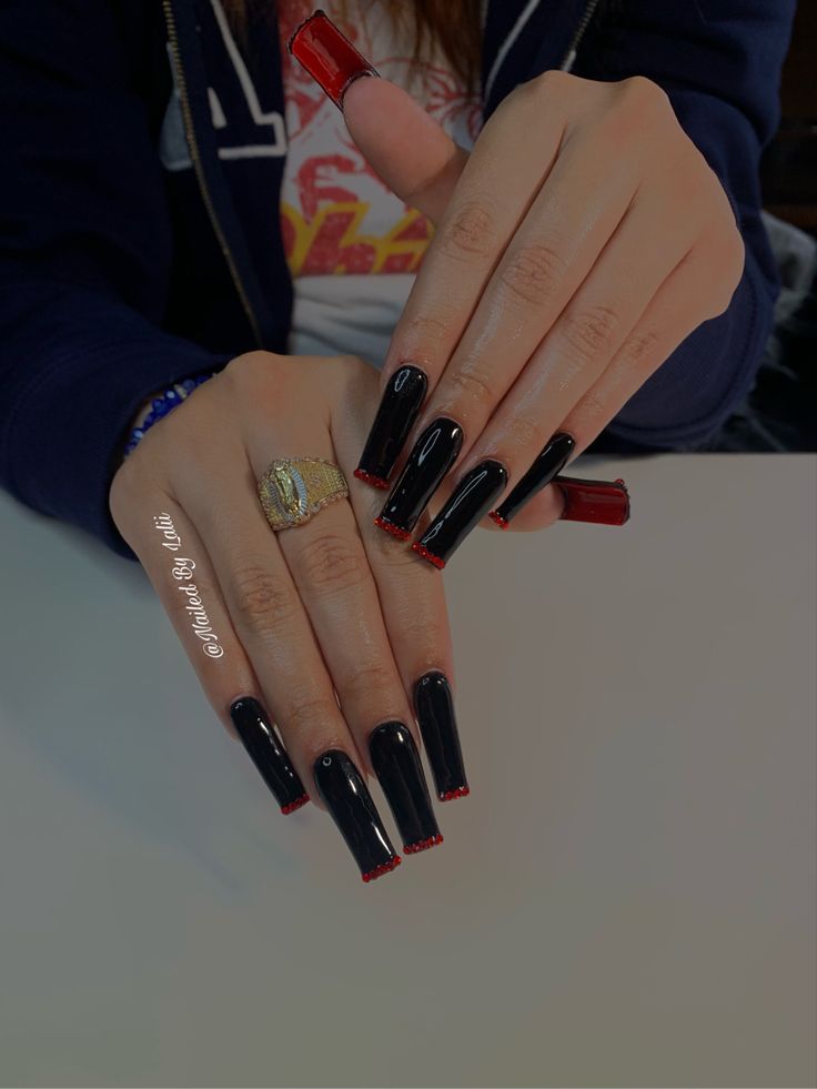 Bold Elegance: Long Glossy Black Nails with Vibrant Red Tips