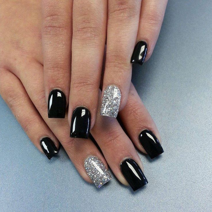 Chic Black and Silver Nail Design: A Modern Blend of Matte and Glitter Elegance.