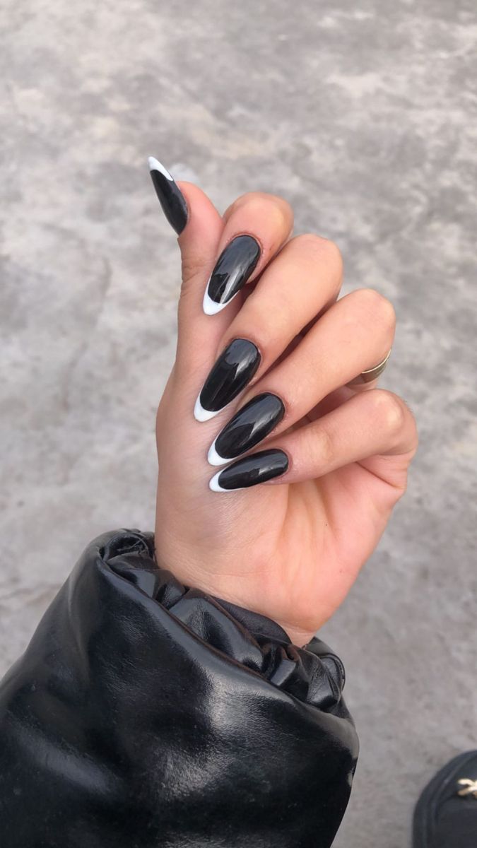 Chic Almond-Shaped Black and White Nail Design for a Bold Statement.