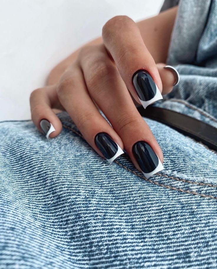 Elegant Navy and White Nail Design: A Chic Fusion of Classic French Tips and Bold Color Blocking.