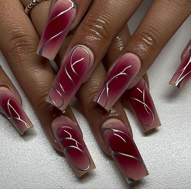 Stunning Ombre Pink Nail Design with Intricate Silver Line Art and Tapered Shape