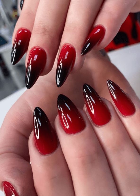 Elegant Ombre Nail Design: Deep Red to Black Gradient in a Glossy Finish.