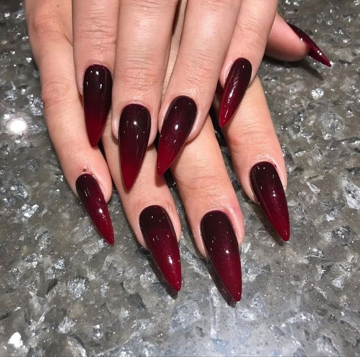 Elegant Ombre Burgundy Almond-Shaped Nails: A Sophisticated Blend of Classic and Trendy Styles.