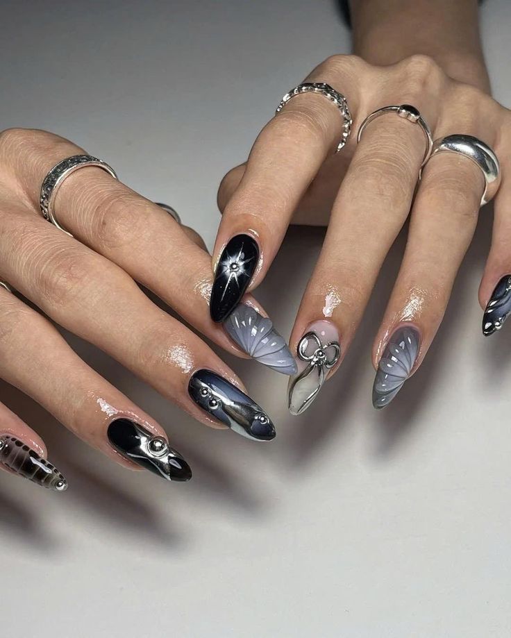 Bold and Elegant Nail Design with Striking Contrast and Artistic Touches.