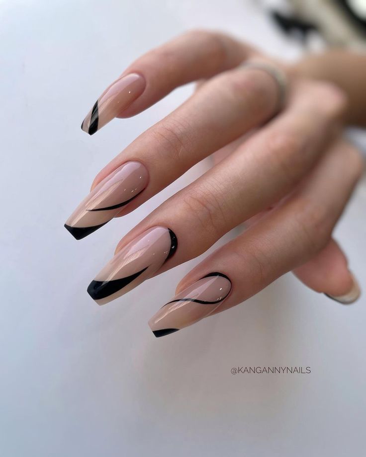 Chic Nude and Black Geometric Nail Design with Elegant Accents.