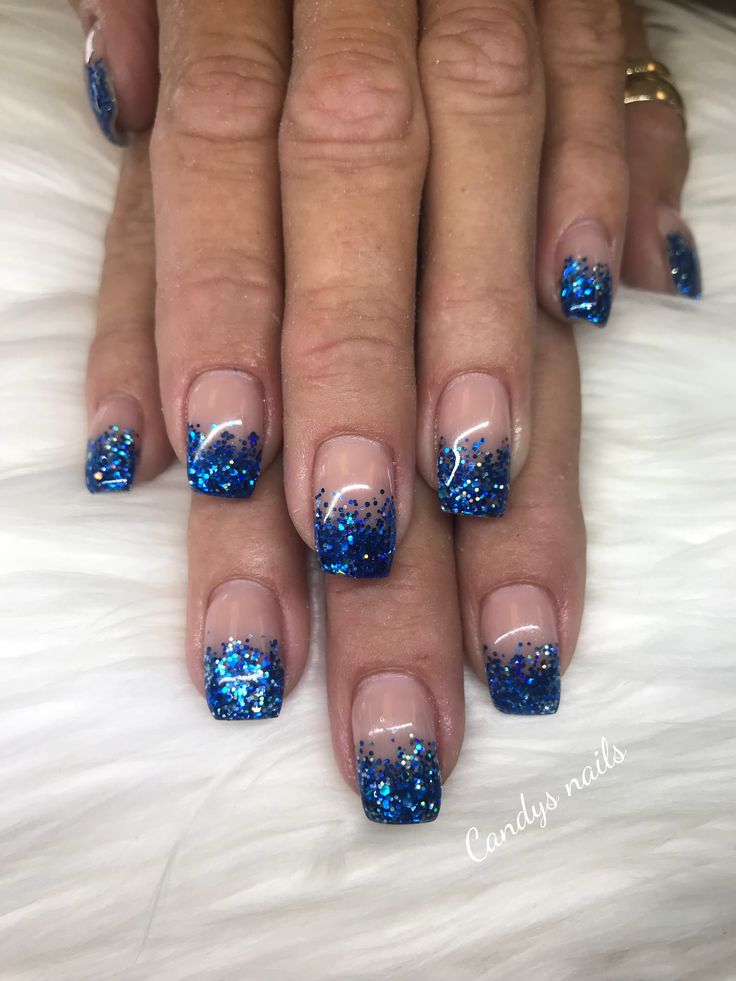 Elegant Gradient Blue Nail Design with Vibrant Glitter Tips