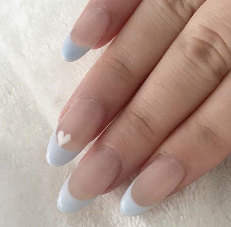 Elegant Pastel Blue French Tip Nail Design with White Heart Accent