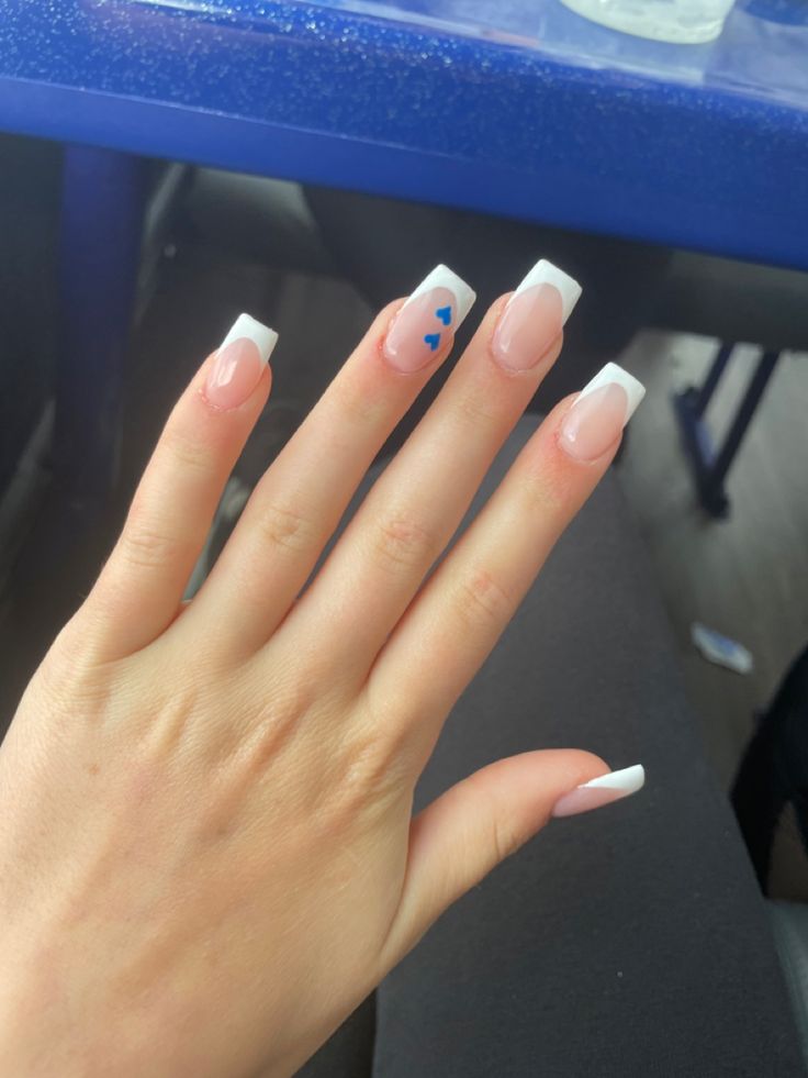 Chic Elegant French Tip Nails with Modern Blue Accents