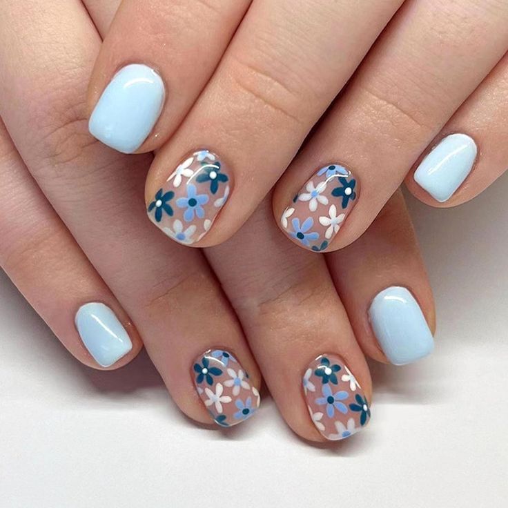 Charming Floral Nail Design in Soft Blue Pastels for Spring.