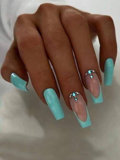 Elegant Light Blue and Nude Nail Design with Shimmering Rhinestones