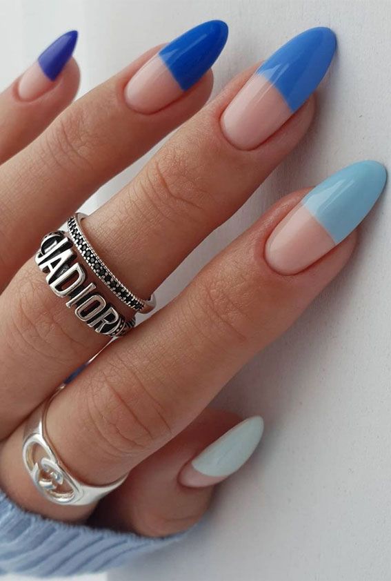 Chic Pointed Nail Design: Bold Blue Meets Soft Pastels with Half-Painted Tips.