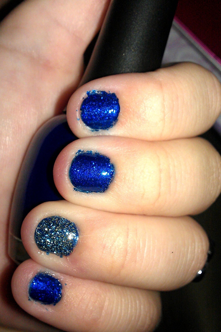 Dazzling Cobalt and Glitter Nail Design for Glamorous Looks.