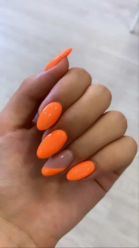 Playful Vibrant Orange Nail Design with Glossy Finish and Mixed Styles.