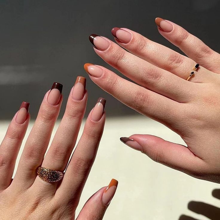 Chic Nail Design: Sophisticated Gradient of Neutral and Warm Tones with Minimalist Rings