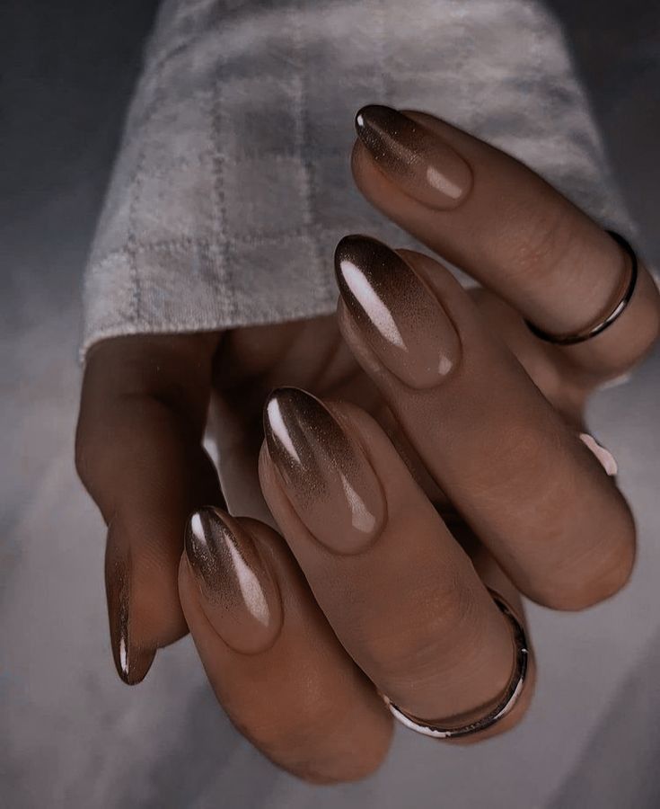 Sophisticated Almond-Shaped Nails with Warm Brown Gradient and Subtle Shimmer