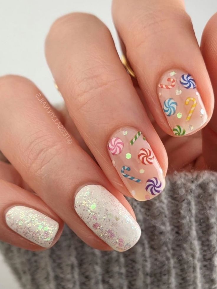 Festive Whimsical Candy-Themed Nail Design with Sparkly Accents.