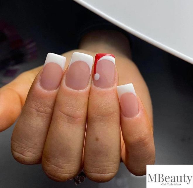 Elegant Chic French Manicure with Bold Red Accent and Playful Dot.